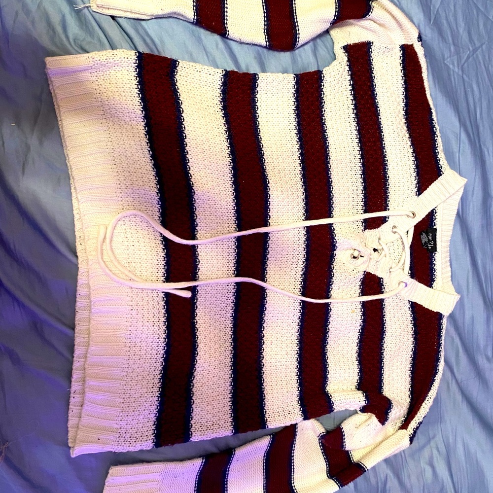 A red and white sweater